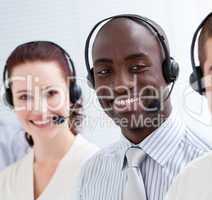 Happy customer service representatives standing in a line