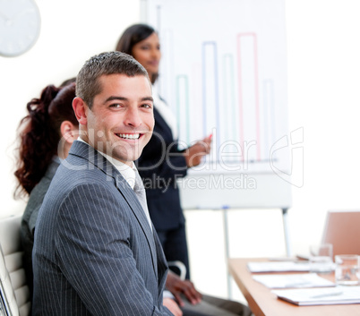 Self-assured young businessman at a presentation