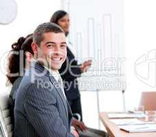 Self-assured young businessman at a presentation