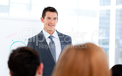 Self-assured businessman doing a presentation