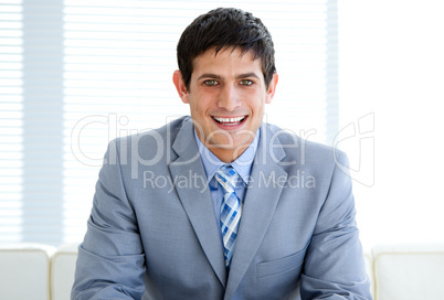 Cheerful male executive in a waiting room