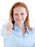 Self-assured business woman doing a thumb-up