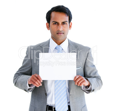 Confident businessman showing a note