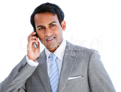 Happy businessman taking a phone call