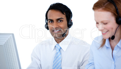 Self-assured sales representative partners with headsets against