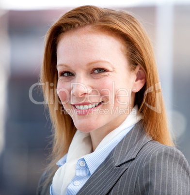 Confident business woman looking at the camera