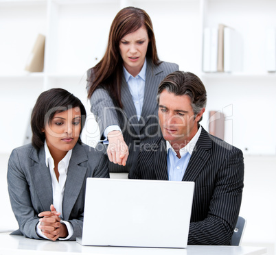 International business team working at a computer