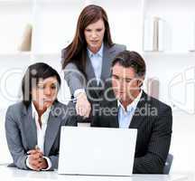 International business team working at a computer