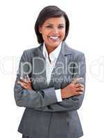 Positive businesswoman with folded arms standing