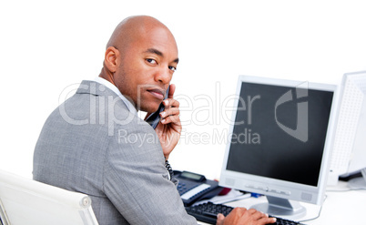 Confident businessman talking on phone