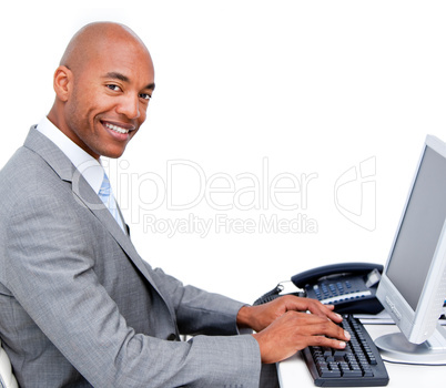 Handsome businessman working at a computer