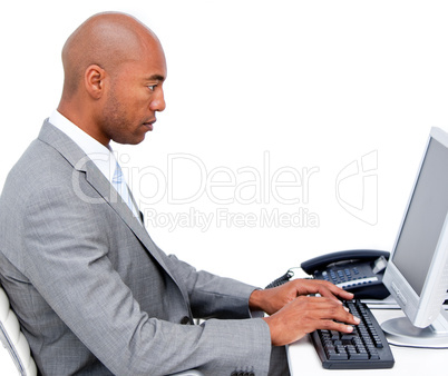 Serious businessman working at a computer