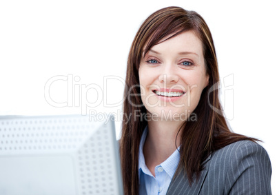Charismatic businesswoman working at a computer