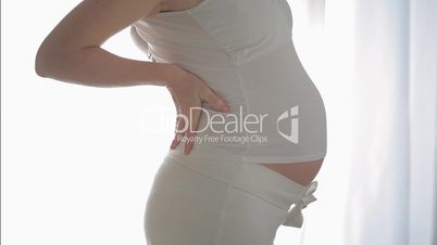 pregnant woman having backache
