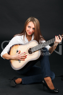 Woman with guitar.