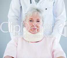 Portrait of a senior woman with a neck brace sitting on a wheelc