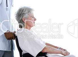 Portrait of a senior woman sitting on a wheelchair