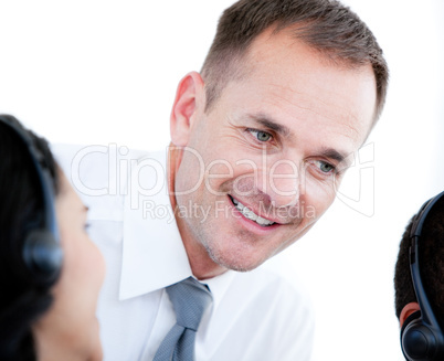 Portrait of a confident businessman talking with his colleague