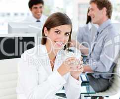 Smiling businesswoman holding a cup of tea