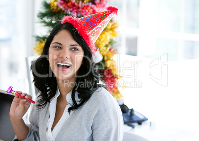 Positive businesswoman celebrating christmas