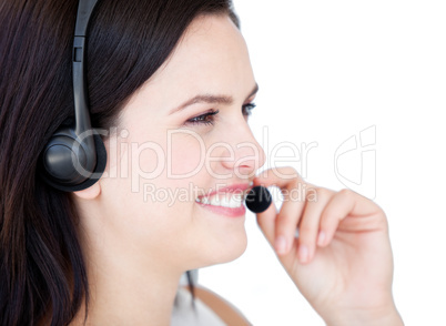 Happy businesswoman wearing a headset to talk with customer