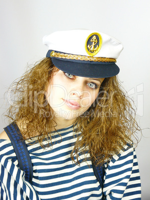 attractive young girl in a captain's cap
