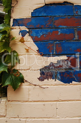 white brick with blue and ivy