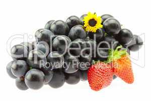 Grapes, strawberries and a flower Isolated on white