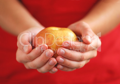 Apple in hands