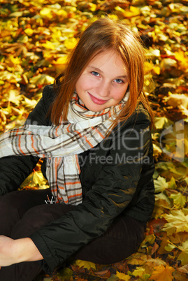 Girl in a fall park