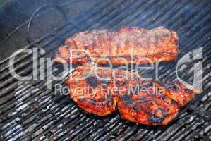 Steaks on barbeque