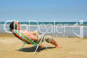 Man relaxing on beach