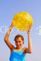 Girl with beach ball
