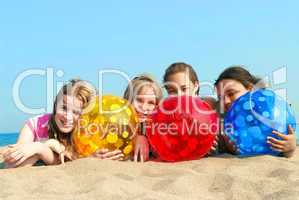 Four girls on a beach