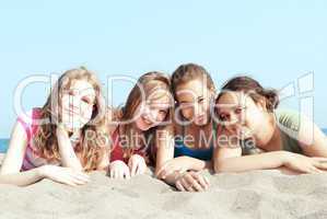Four girls on a beach