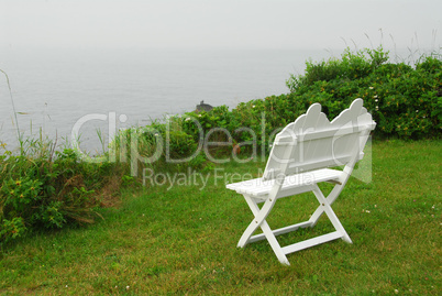 Bench on ocean shore