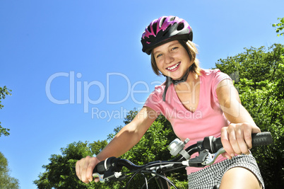 Teenage girl on a bicycle