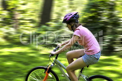 Teenage girl on a bicycle