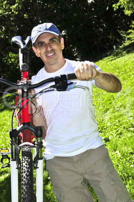 Man carrying a bicycle