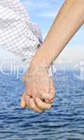 Couple holding hands