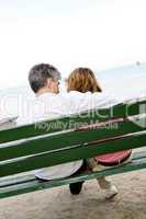 Mature romantic couple on a bench
