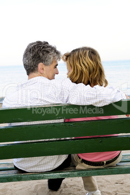 Mature romantic couple on a bench