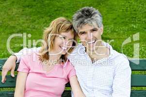 Mature romantic couple on a bench