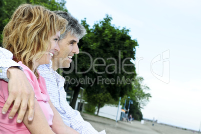 Mature romantic couple on a bench