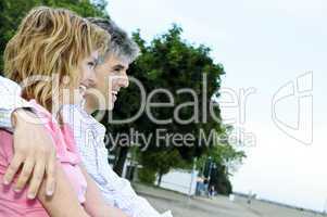 Mature romantic couple on a bench