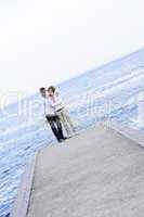 Mature romantic couple on a pier