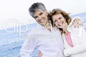 Mature romantic couple at seashore
