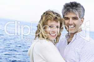 Mature romantic couple at seashore