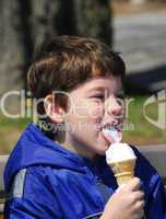 Boy licking ice cream