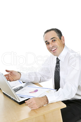 Businessman at his desk on white background